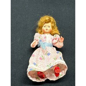 Vintage 3”  Doll With Red Hair Blue Eyes Painted Face Floral Dress & Red Shoes